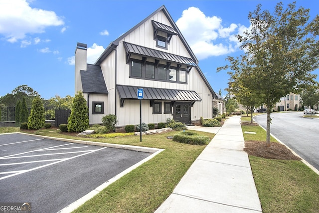 view of front of home with a front lawn