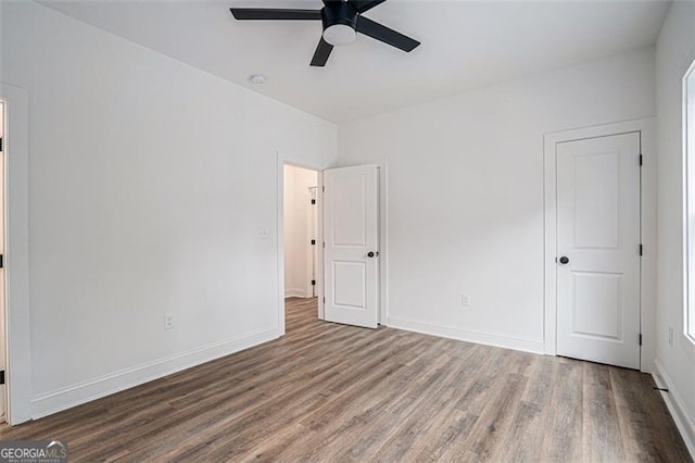 unfurnished bedroom with wood-type flooring and ceiling fan