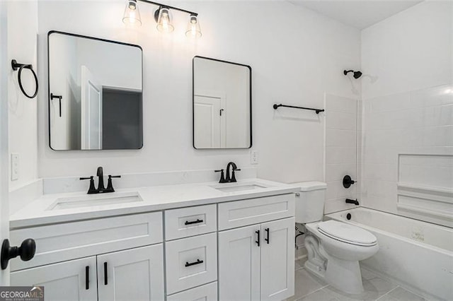 full bathroom with washtub / shower combination, vanity, and toilet