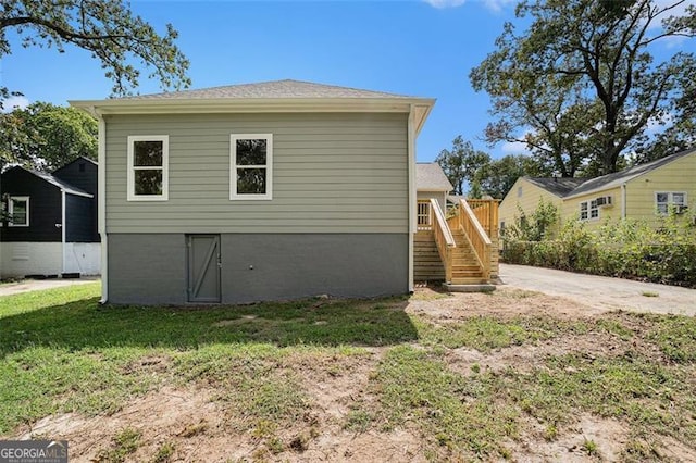 view of home's exterior featuring a yard