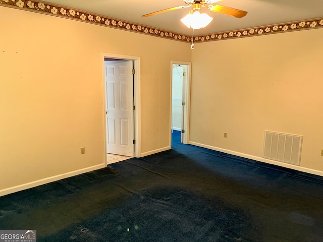 unfurnished bedroom with carpet floors and ceiling fan