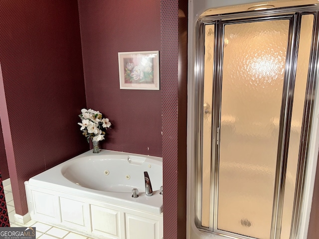 bathroom with plus walk in shower and tile patterned flooring