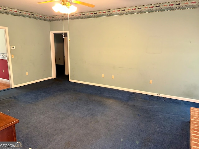 unfurnished room featuring carpet and ceiling fan