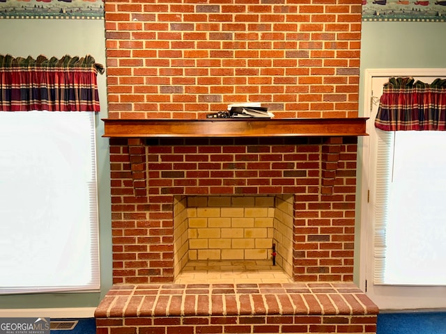 room details featuring a fireplace