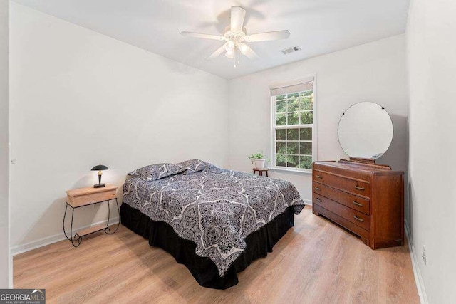 bedroom featuring ceiling fan and light wood-type flooring