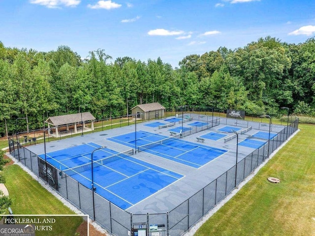 view of tennis court with basketball court and a lawn