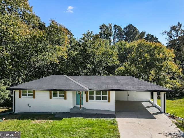 single story home featuring a front yard and a carport