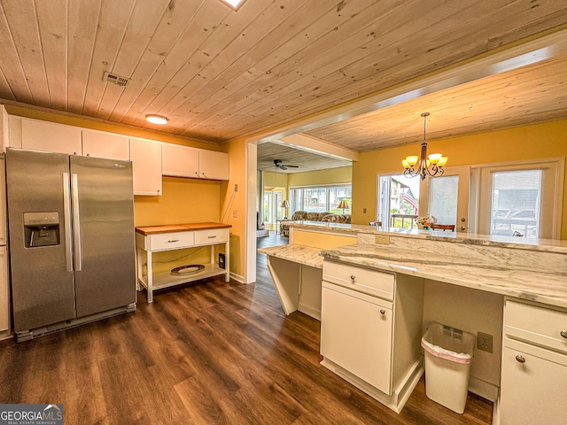 kitchen featuring light stone counters, ceiling fan with notable chandelier, wooden ceiling, stainless steel refrigerator with ice dispenser, and dark hardwood / wood-style floors