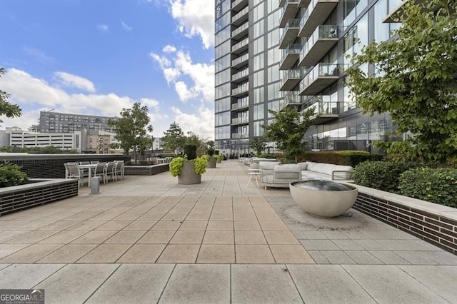 view of home's community with a patio