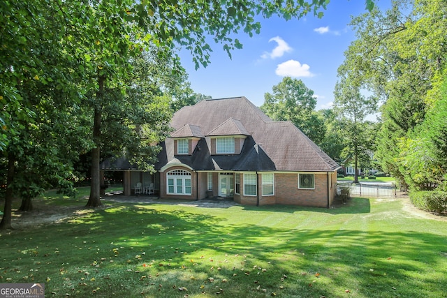 view of front of home with a front yard