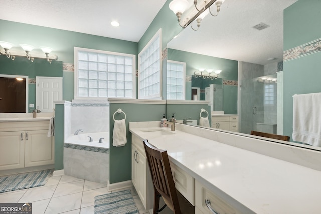 bathroom featuring vanity, a textured ceiling, independent shower and bath, an inviting chandelier, and tile patterned floors