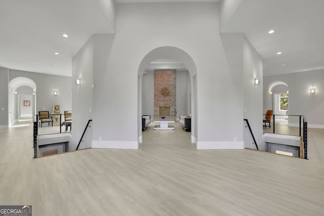 corridor featuring light hardwood / wood-style flooring