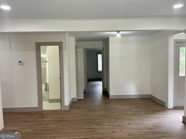 hallway featuring dark wood-type flooring