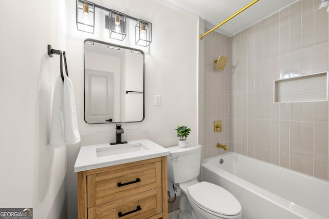 full bathroom featuring tiled shower / bath combo, vanity, and toilet