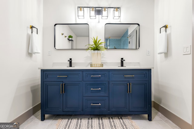 bathroom with vanity and tile patterned floors