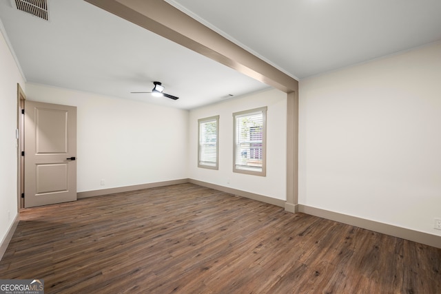 unfurnished room with ceiling fan, crown molding, and dark hardwood / wood-style flooring