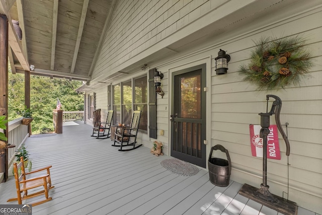 wooden terrace with covered porch