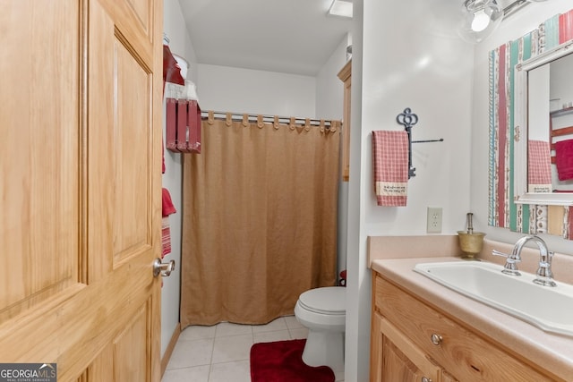 full bathroom featuring curtained shower, toilet, vanity, and tile patterned flooring