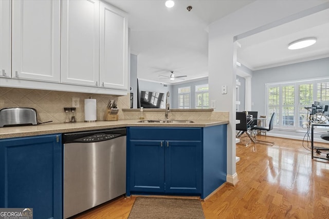 kitchen featuring ceiling fan, dishwasher, sink, and a healthy amount of sunlight