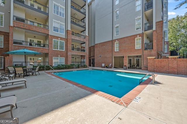 view of pool with a patio