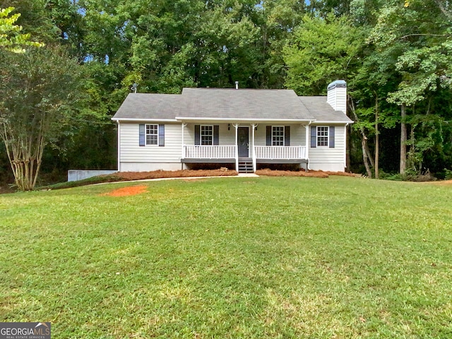 single story home featuring a front yard and covered porch