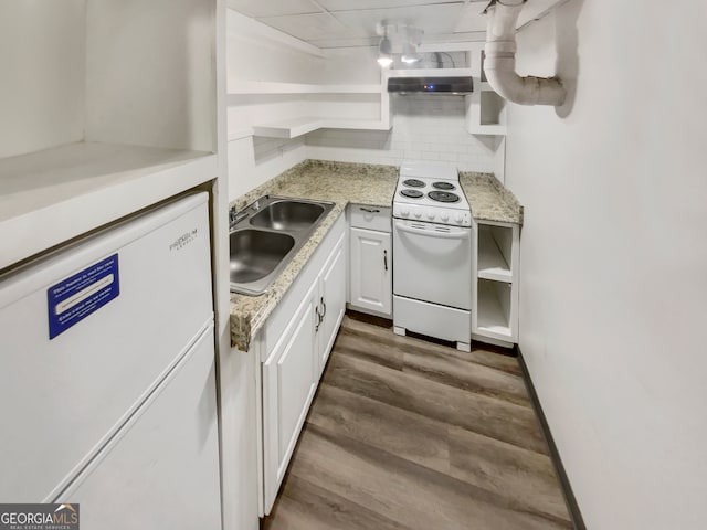 kitchen with white cabinets, sink, white appliances, tasteful backsplash, and dark hardwood / wood-style flooring