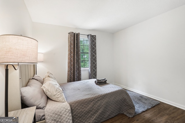 bedroom with wood-type flooring