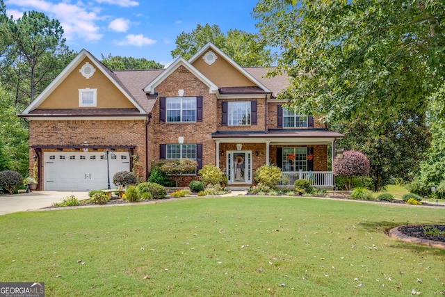 view of front of home with a porch, brick siding, driveway, and a front yard
