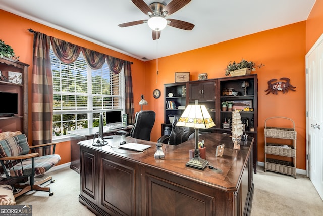 office with ceiling fan and light colored carpet