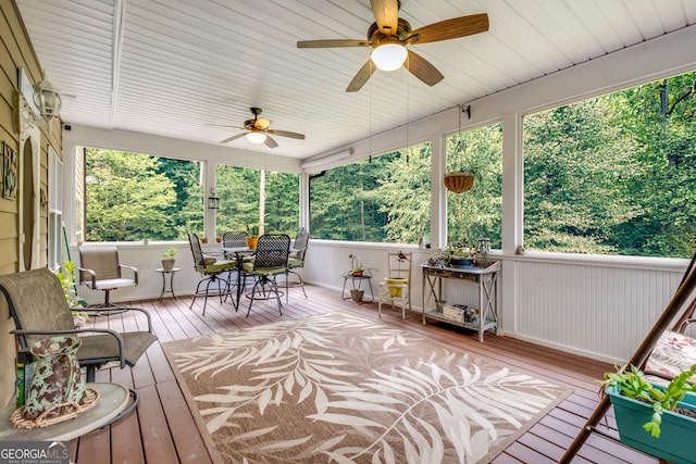 sunroom / solarium with ceiling fan and plenty of natural light