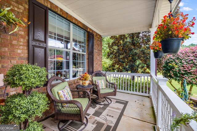 balcony featuring covered porch