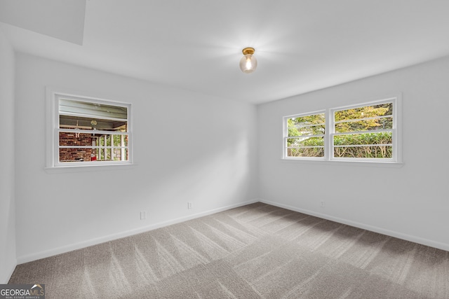 view of carpeted spare room