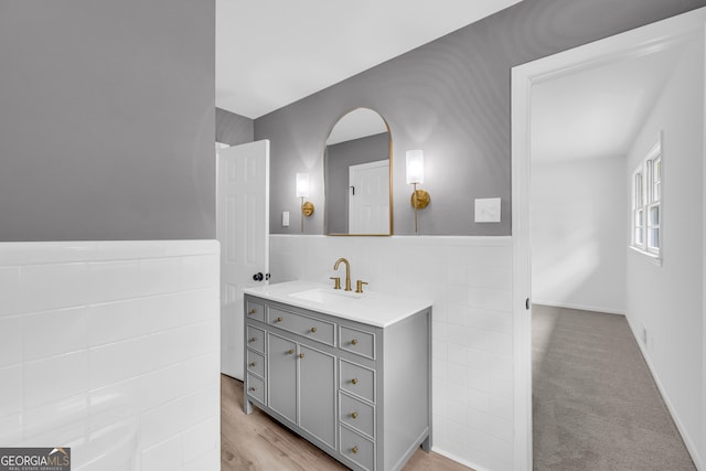 bathroom featuring vanity and hardwood / wood-style floors