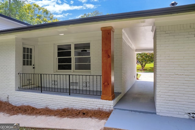 entrance to property with covered porch