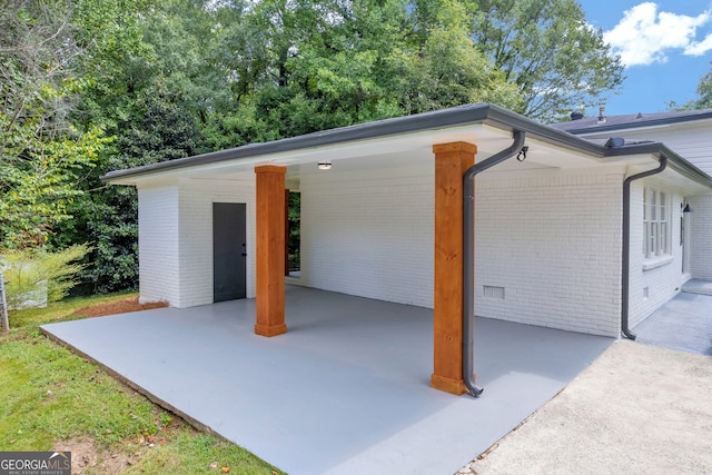 view of patio / terrace featuring a carport