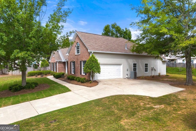 view of side of home featuring a lawn, cooling unit, and a garage