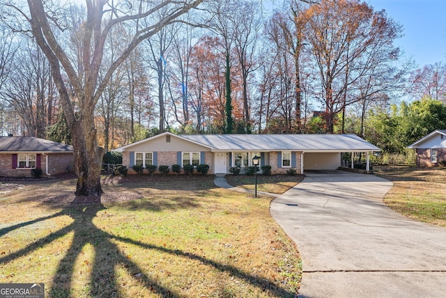 single story home featuring a carport and a front lawn