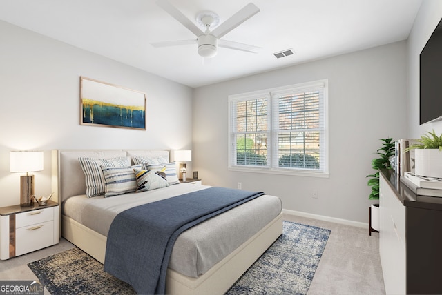 carpeted bedroom with ceiling fan