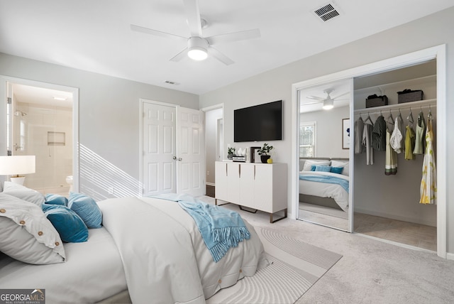 bedroom with light carpet and ceiling fan