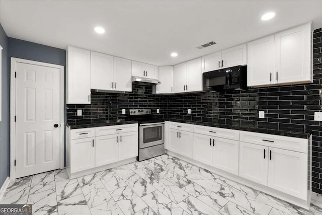 kitchen featuring stainless steel range with electric cooktop, white cabinets, tasteful backsplash, and sink