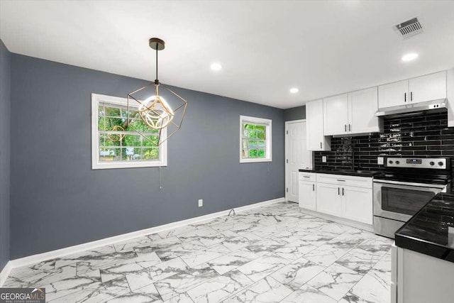 kitchen featuring white cabinets, pendant lighting, sink, tasteful backsplash, and stainless steel electric stove