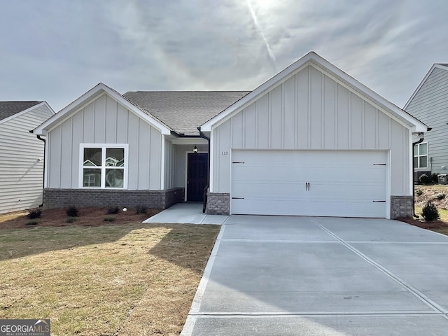 view of front of home with a garage, driveway, roof with shingles, board and batten siding, and brick siding