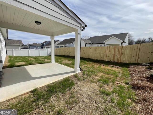 back of property featuring central AC unit, a yard, french doors, and a patio area