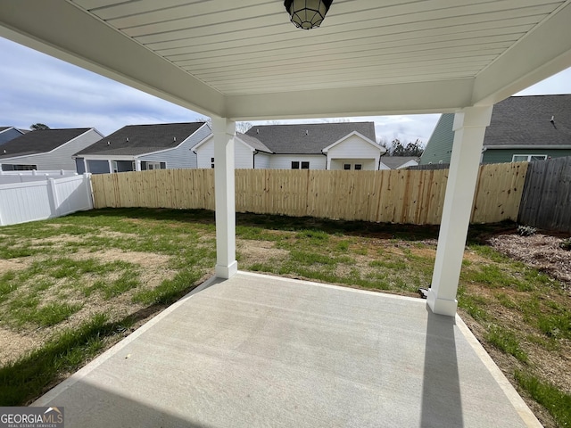 118 Charleston Ln, Milner, GA 30257 - fenced backyard with a patio