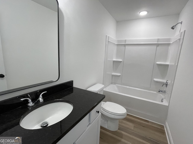 119 Savannah Way Unit C10, Milner, GA 30257 - bathroom featuring wood finished floors, toilet, bathing tub / shower combination, and vanity