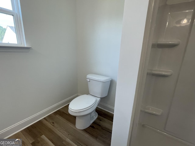 119 Savannah Way Unit C10, Milner, GA 30257 - full bathroom with wood finished floors, toilet, a shower, and baseboards