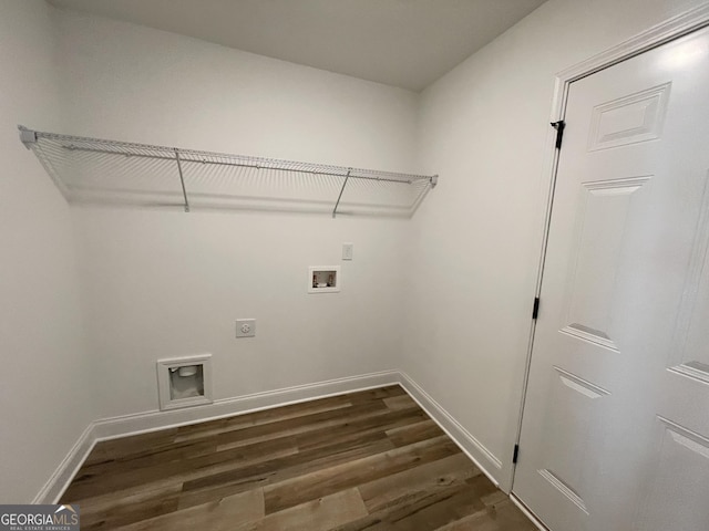 washroom with laundry area, baseboards, dark wood-style floors, hookup for a washing machine, and hookup for an electric dryer