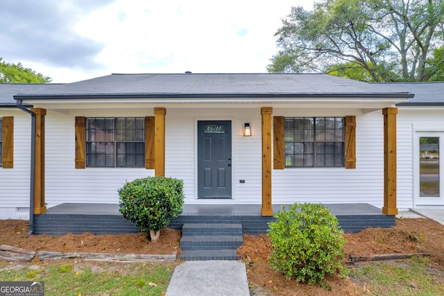 view of front of property featuring covered porch