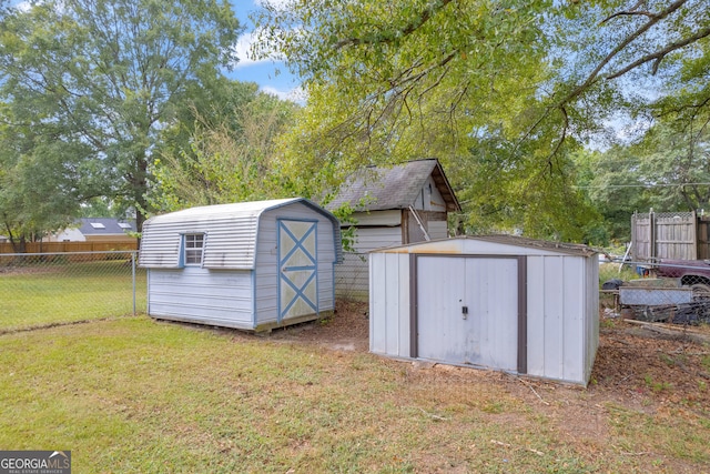 view of outdoor structure with a yard