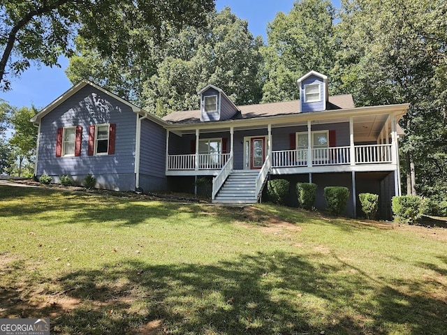 cape cod-style house featuring covered porch and a front yard